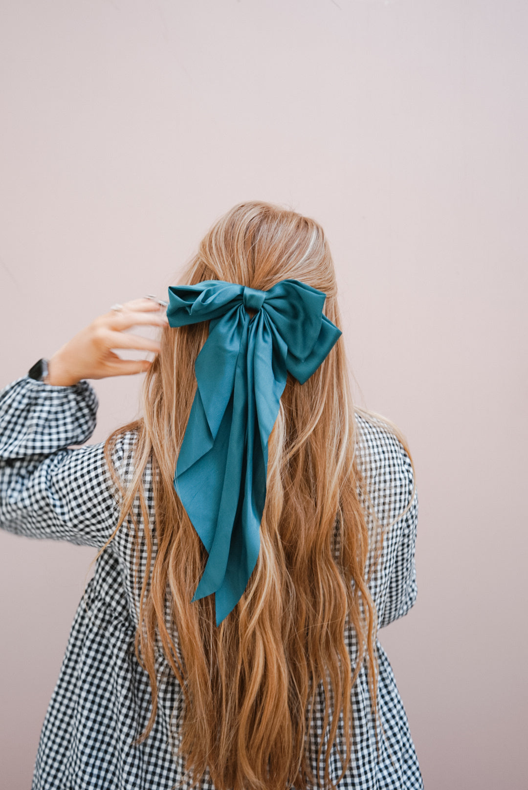 the dark green silk bow