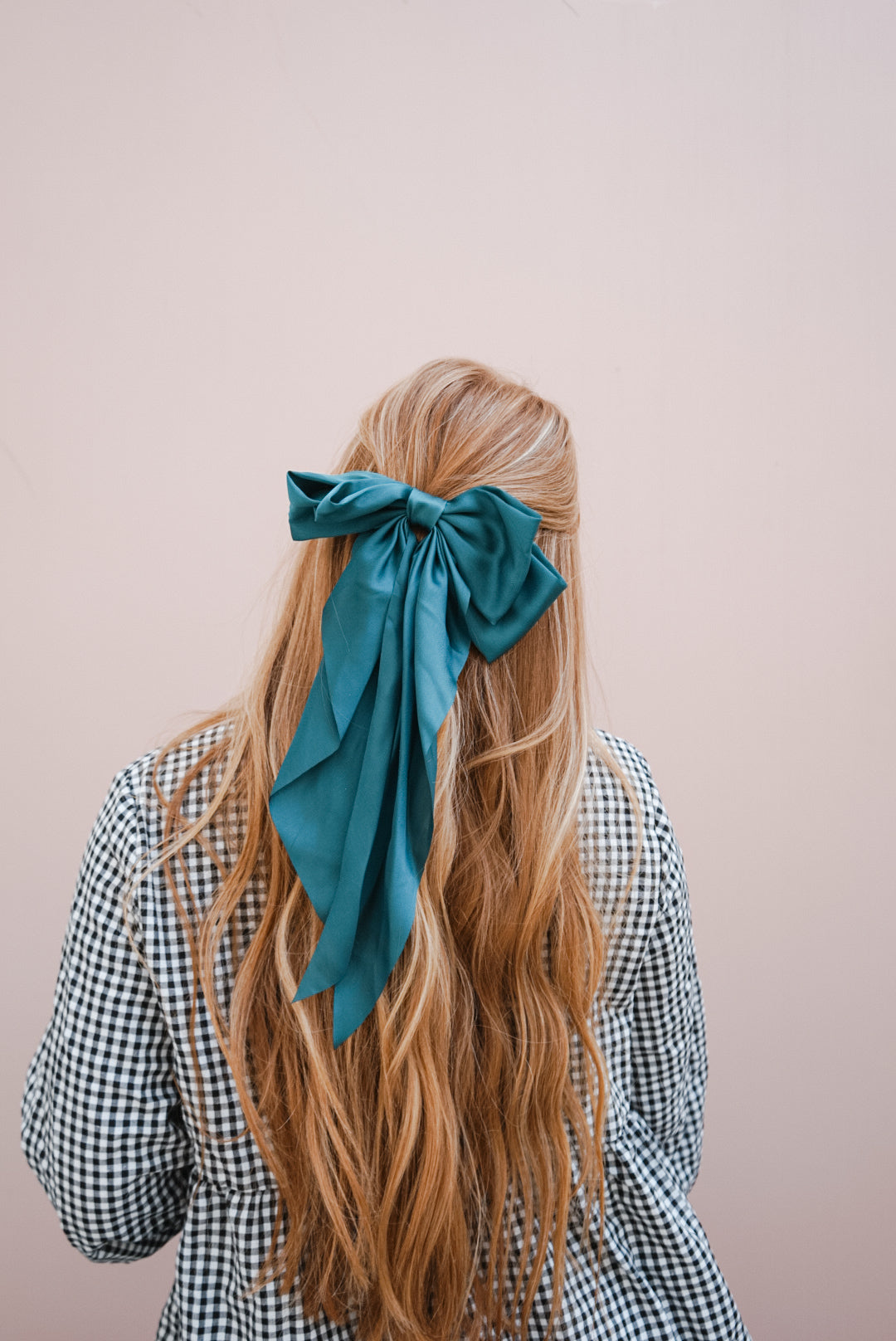 the dark green silk bow