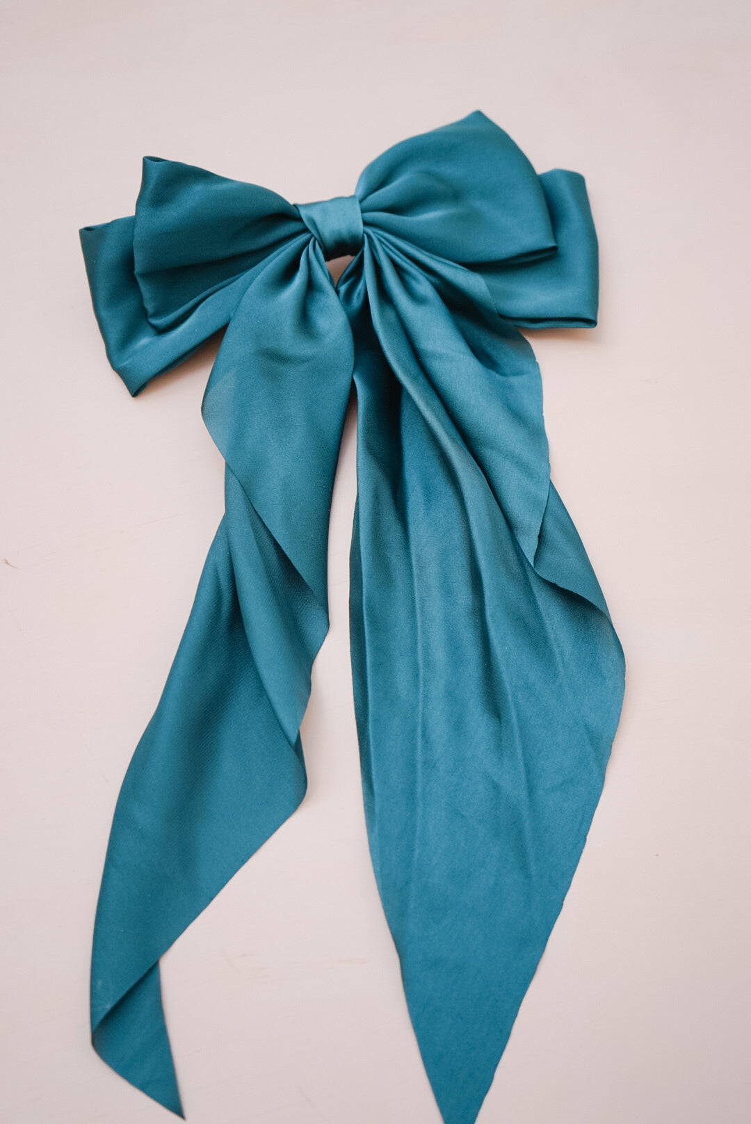 the dark green silk bow