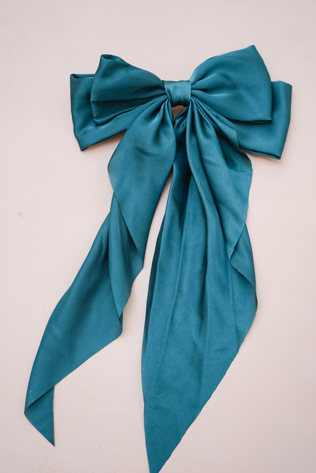 the dark green silk bow