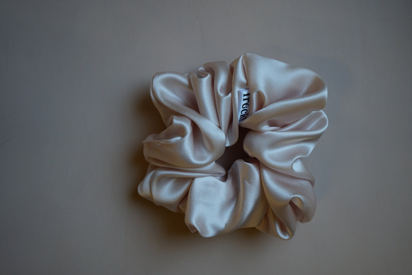 the petal pink oversized silk charmeuse scrunchie