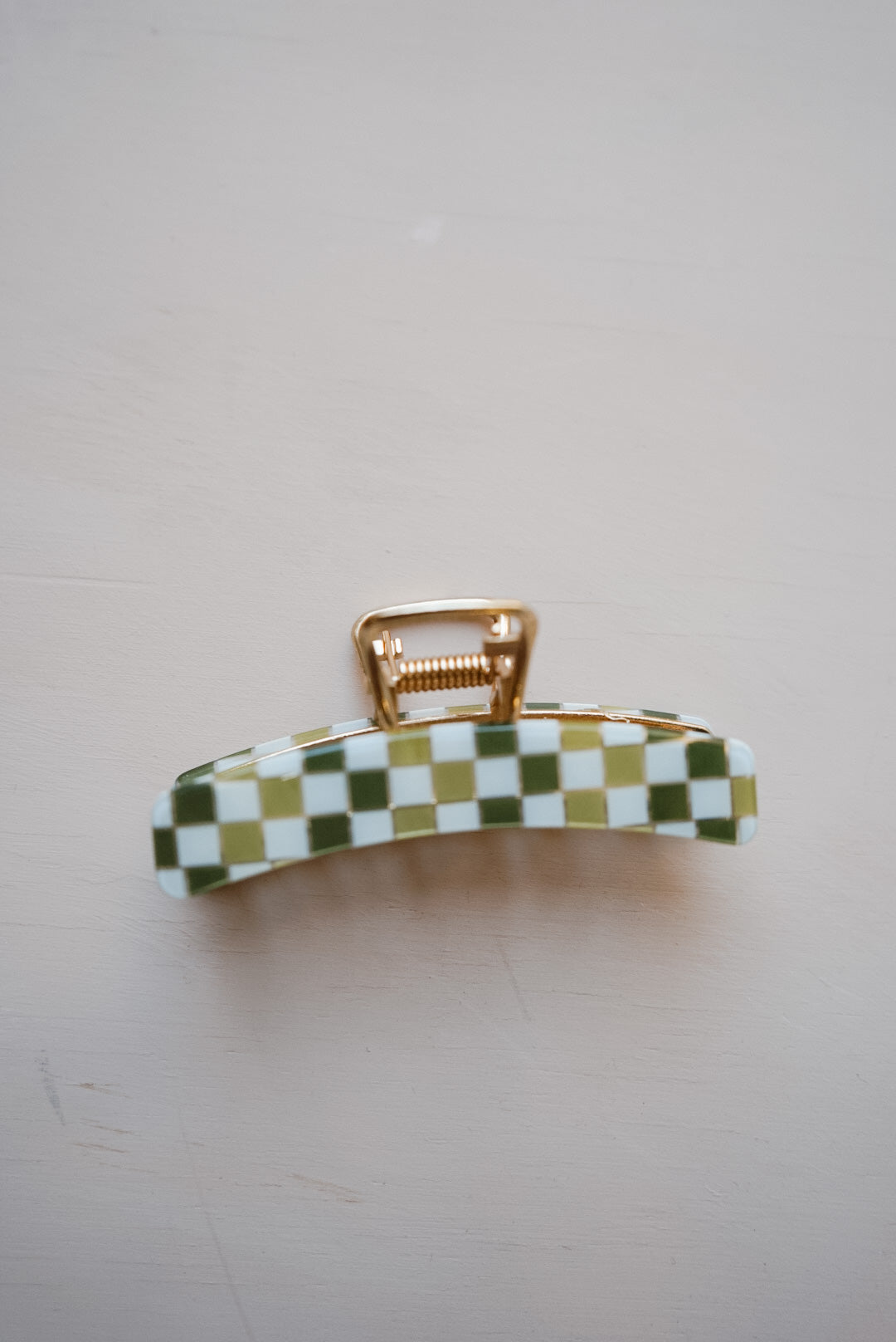 the green girl checker metal claw